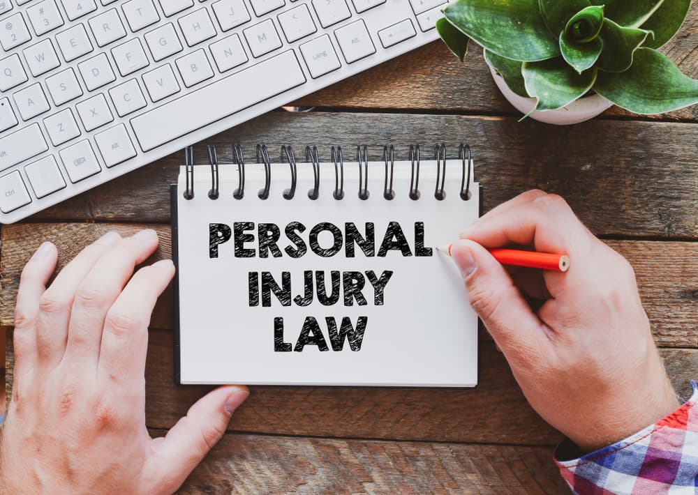 Inscription of personal injury law on a note.
