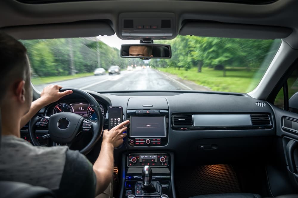 Hands on the wheel when driving from inside the car.